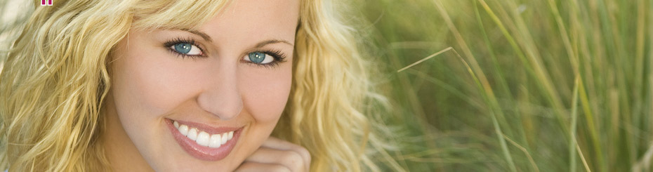 smiling woman in the grass